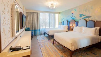 A bedroom in a Deluxe Studio at The Villas at Disneyland Hotel